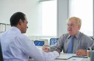 A Medical Financer having a Meeting with a Physician